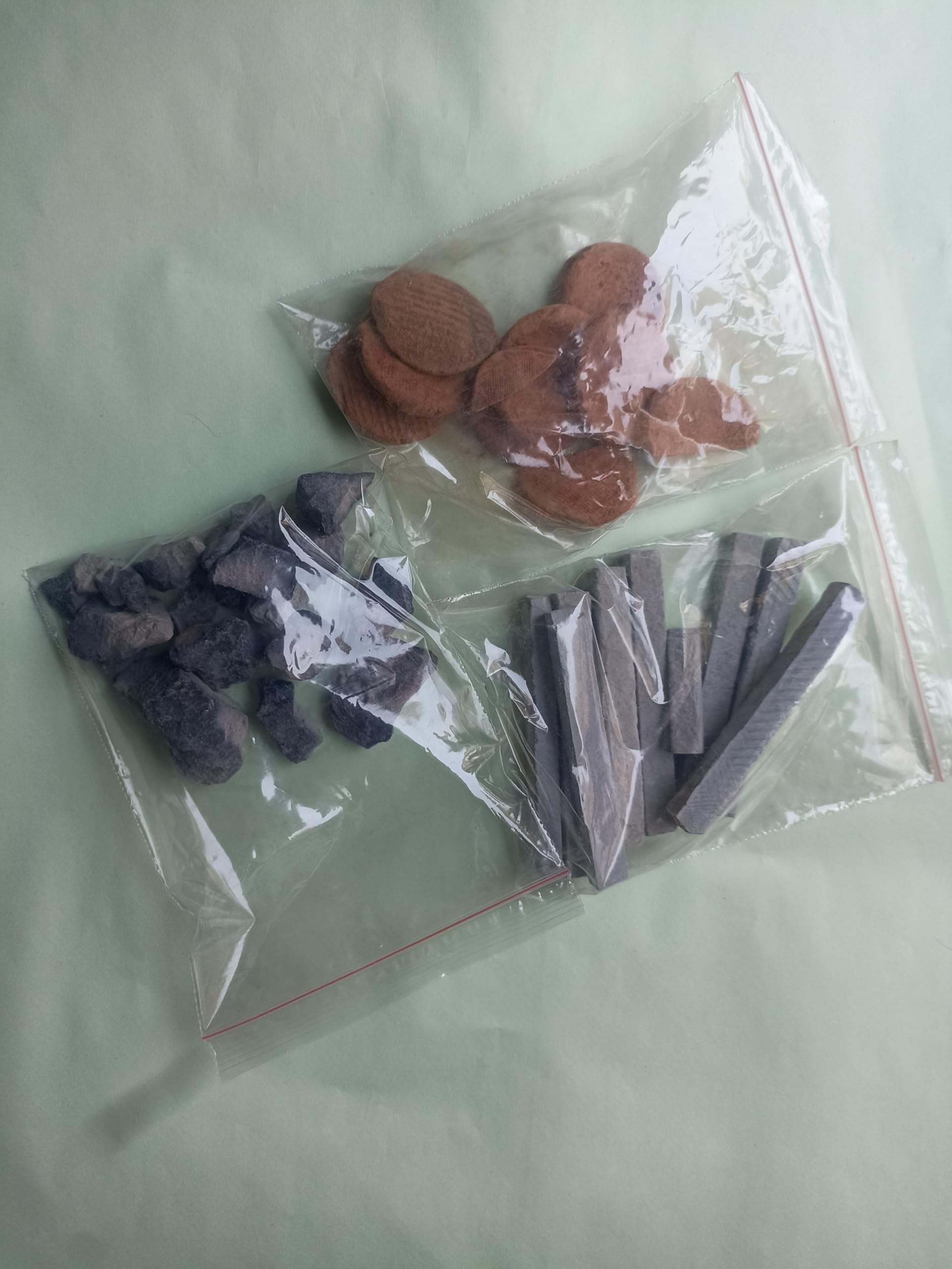 A pack of 500 gms(black slate pencil, full roasted nakumatt, punjabi mitti buiscuits)