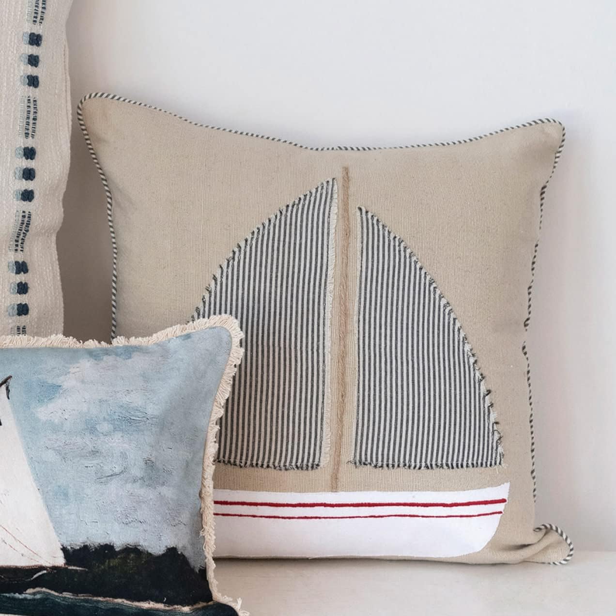 Beige Cotton Pillow with Appliqued Boat and Striped Piping