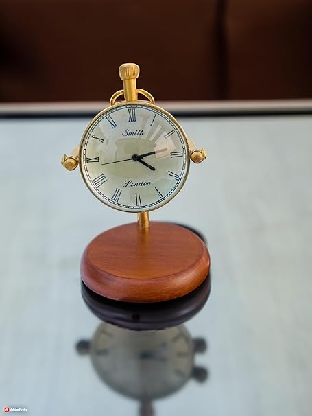 Brass Table Clock with Two Face Dial and Wooden Base Writing Quote The Present time has one Advantage Over Every Other - it is Our own. (Brass Polish)