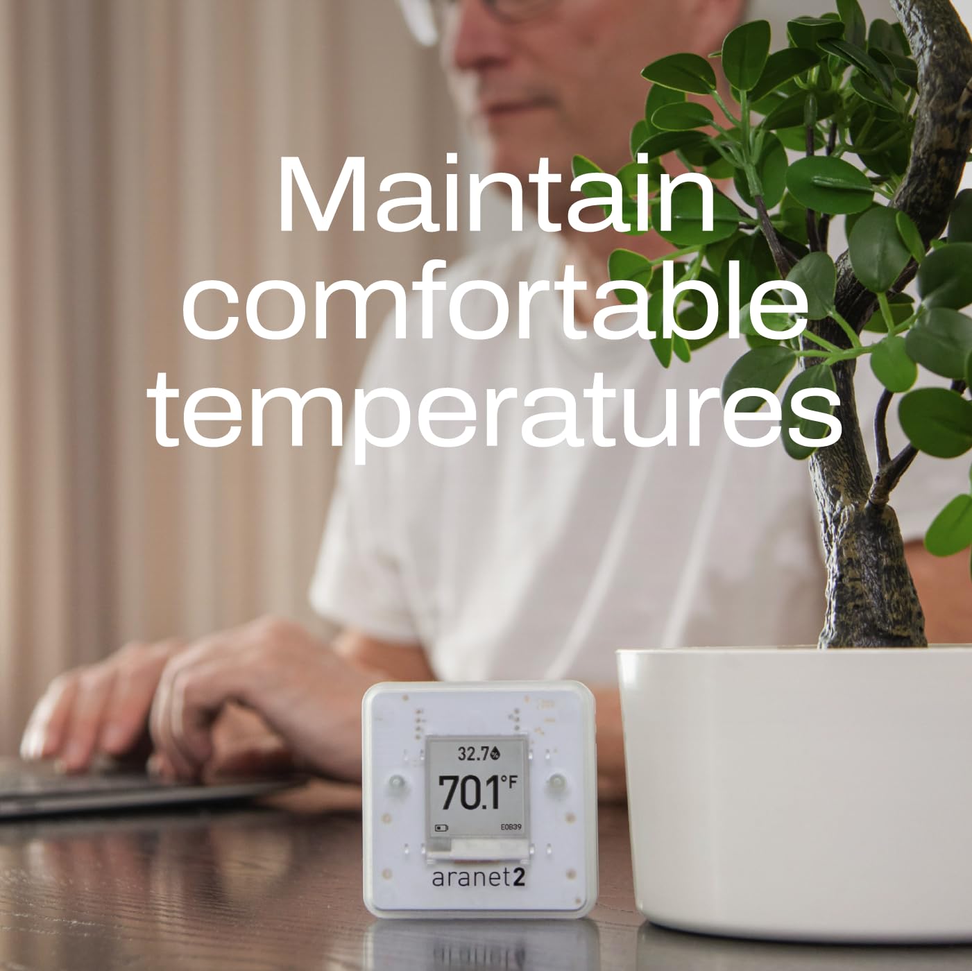 Aranet2 Humidity and Temperature Sensor display showing temperature and humidity readings with text 'Maintain comfortable temperatures'.