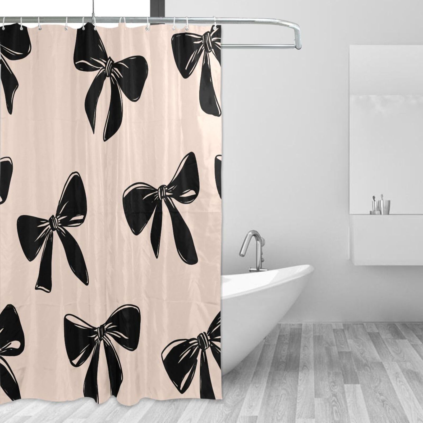 Rideau de douche motif nœud noir idéal pour rafraîchir la déco d'une salle d'eau