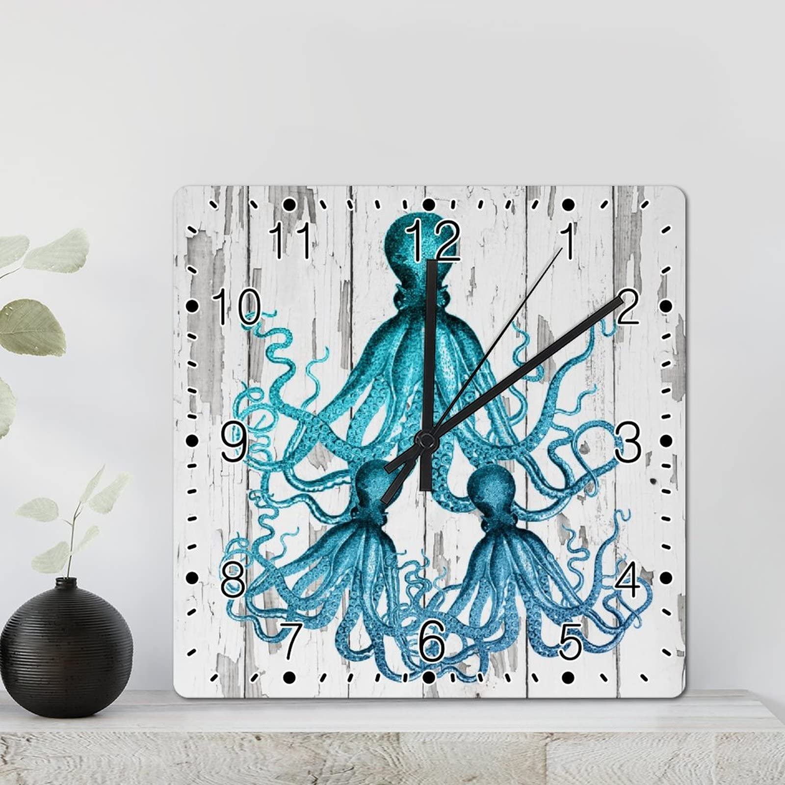 Horloge murale carrée pieuvre pour créer une ambiance de maison de plage