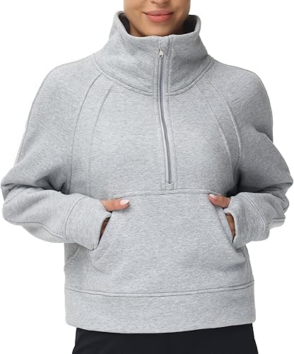 THE GYM PEOPLE Sudadera corta de forro polar con media cremallera para mujer con bolsillos y agujero para el pulgar