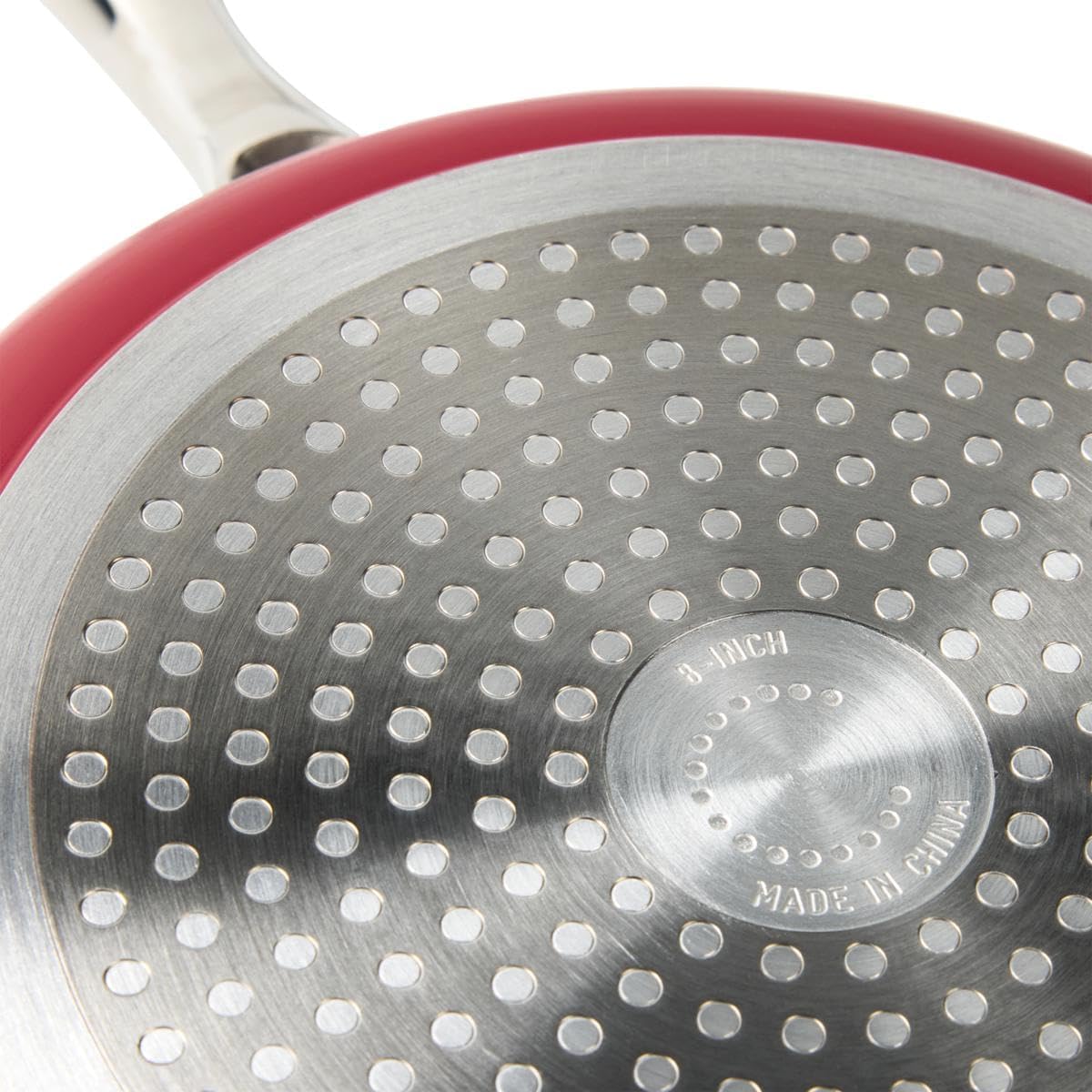 Bottom of Curtis Stone Sauté Pan showing induction base