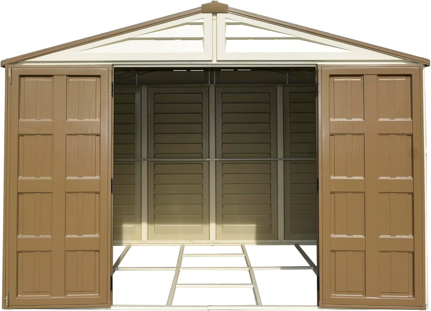 Shed interior showing the metal foundation kit before wall installation