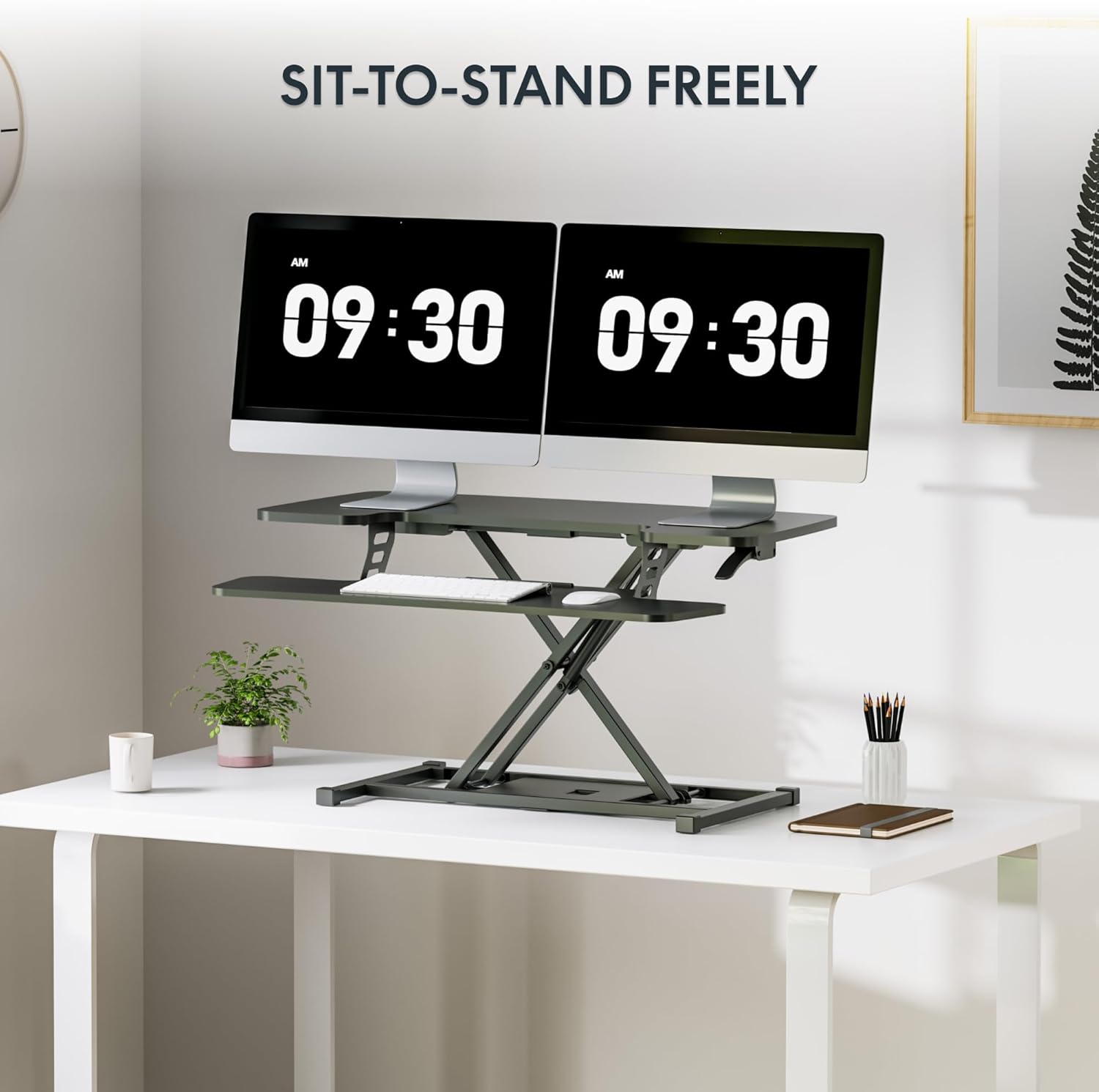 Stran view of the FLEXISPOT desk converter demonstrating height adjustment from 4.7 to 19.6 inches