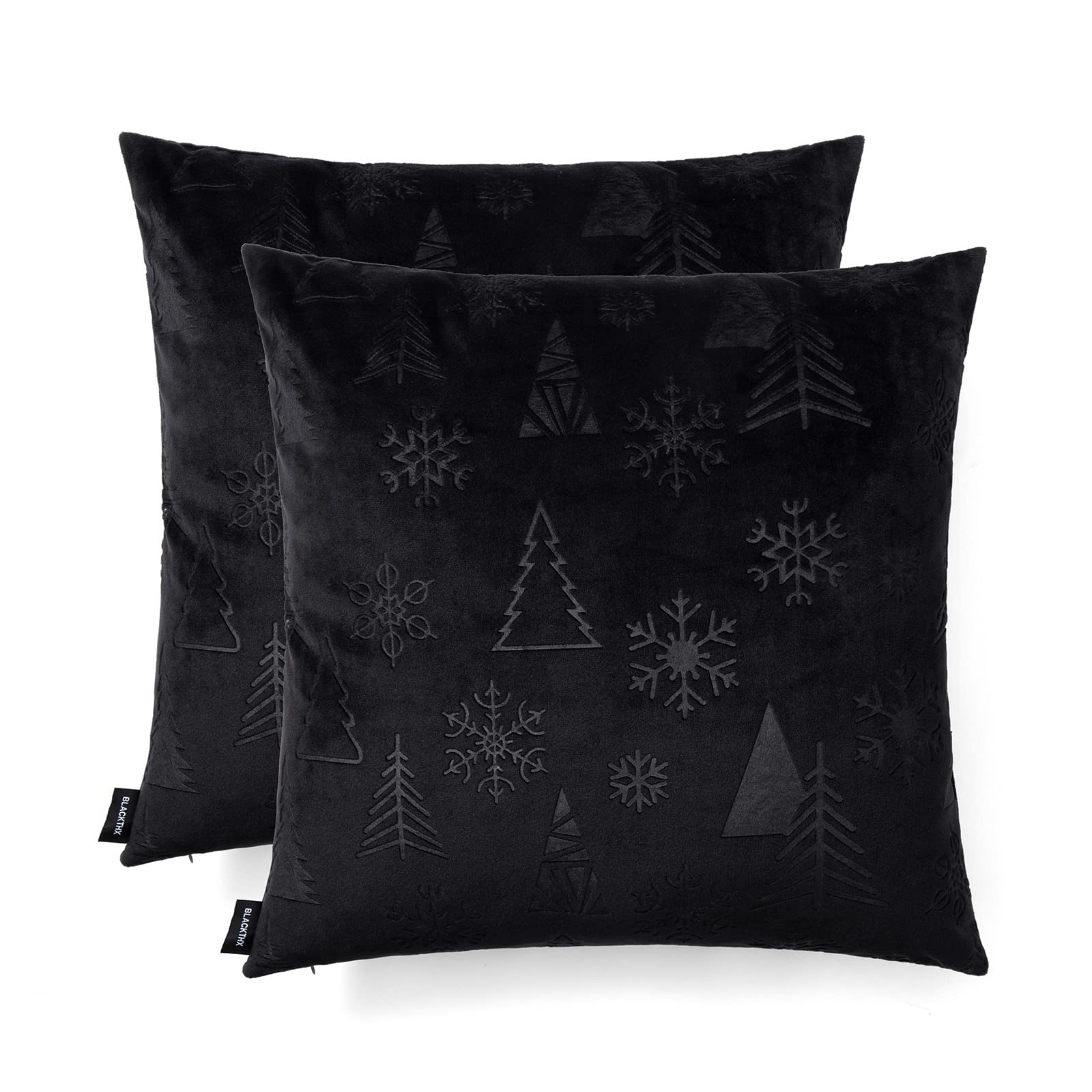 Housses de coussin en velours noir pour un canapé chaleureux et cosy