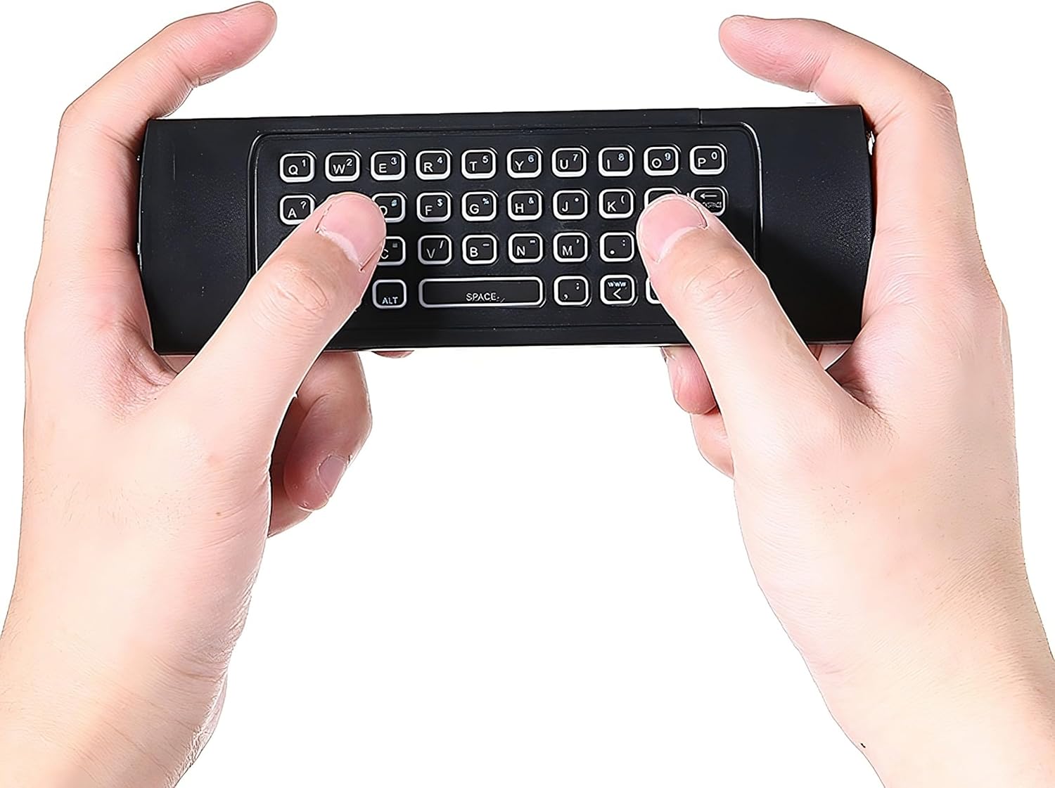 Hands holding Retoo Air Mouse Remote Control, using the keyboard side