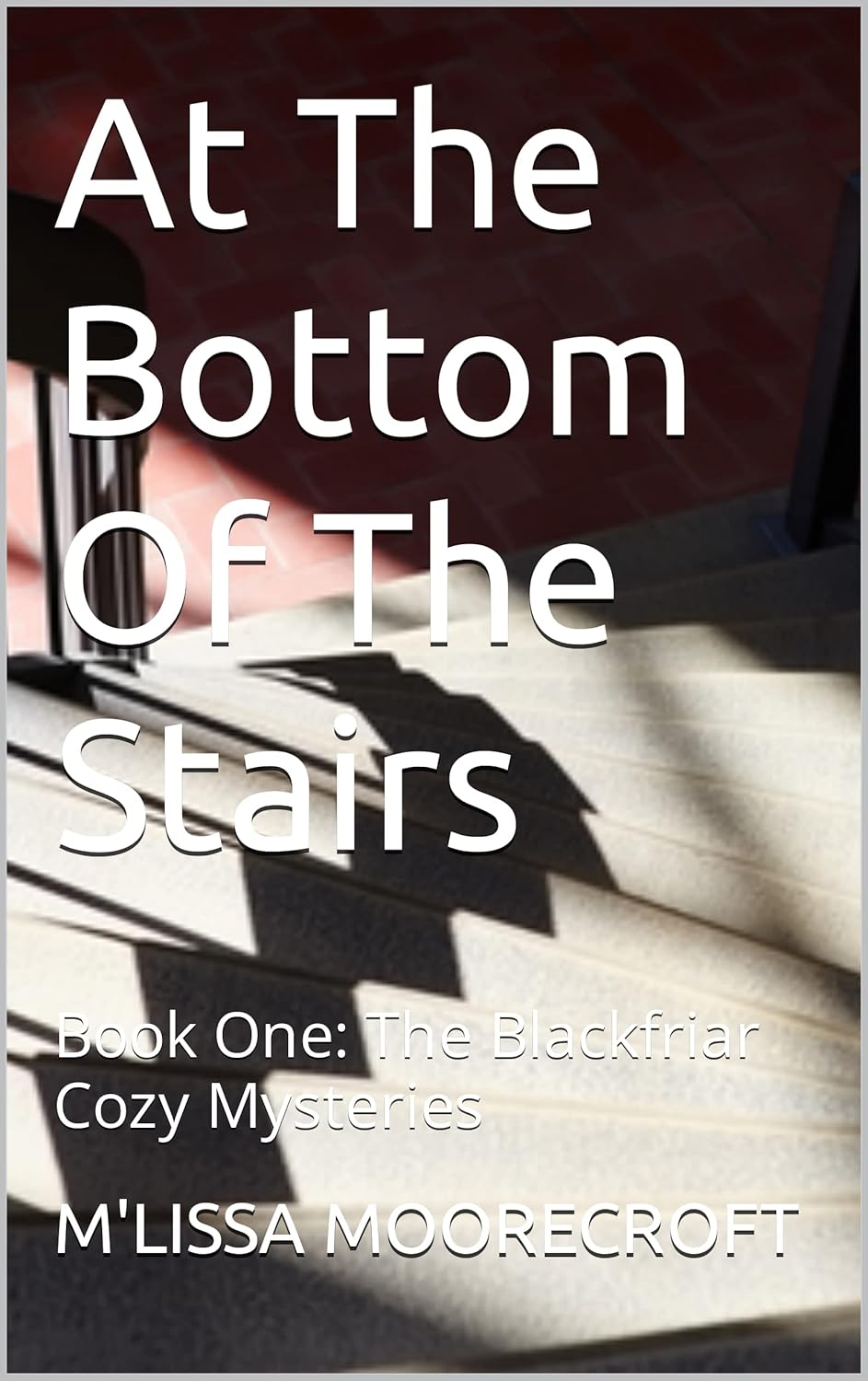 AT THE BOTTOM OF THE STAIRS Book One The Blackfriar Cozy