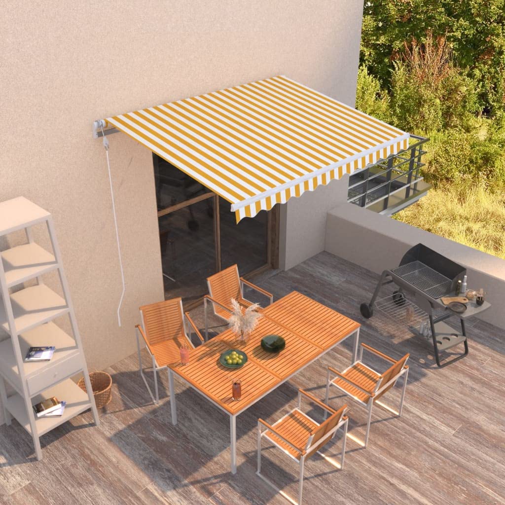 Auvent manuel 350x250 cm jaune et blanc pour abriter le repas de terrasse