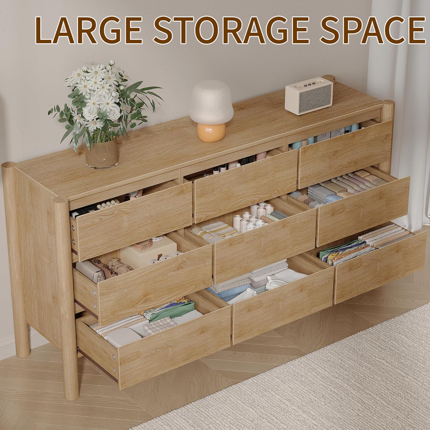 An overhead view of the CHUWELL dresser with multiple drawers open, revealing organized storage for various items like clothes, books, and accessories.