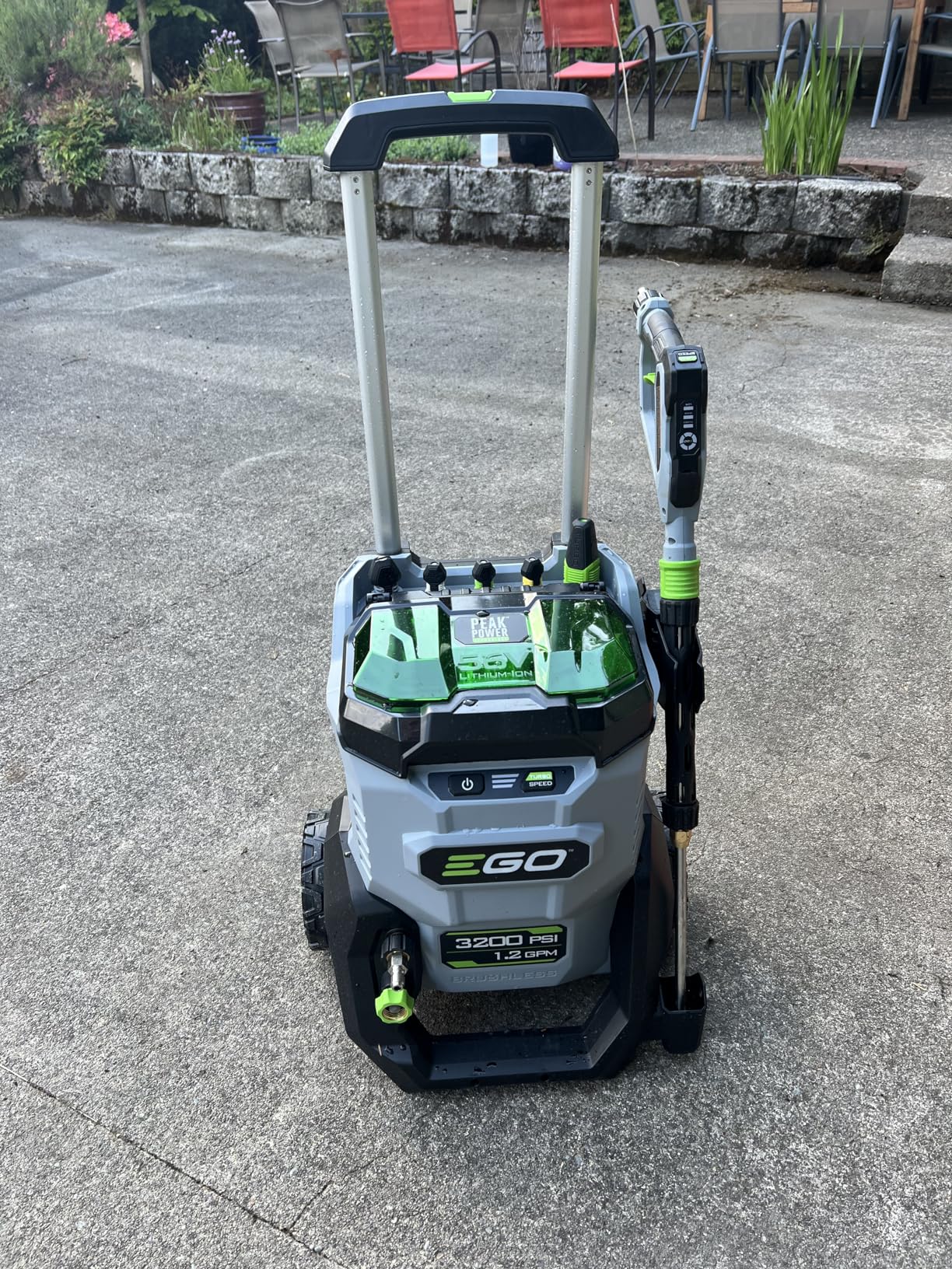 EGO HPW3200 56V cordless pressure washer cleaning a van side panel