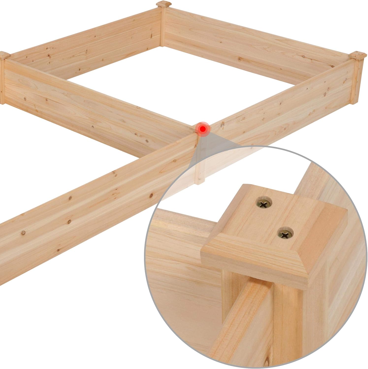 A person watering plants in a fully planted Yaheetech Raised Garden Bed with a watering can.