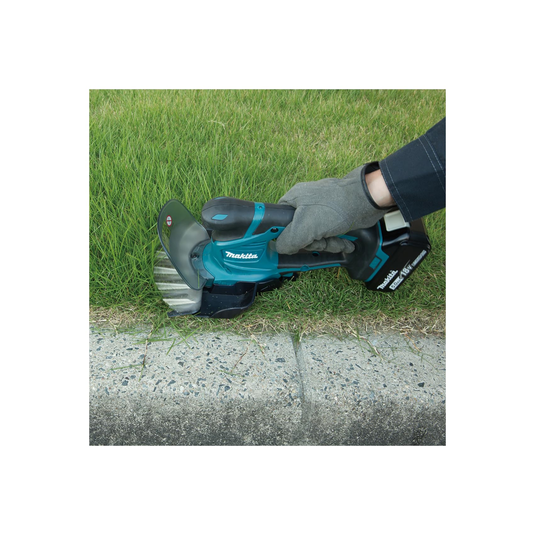 Makita DUM604RTX 18V Li-Ion LXT Grasschere komplett mit 1 x 5,0 Ah Akku und Ladegerät