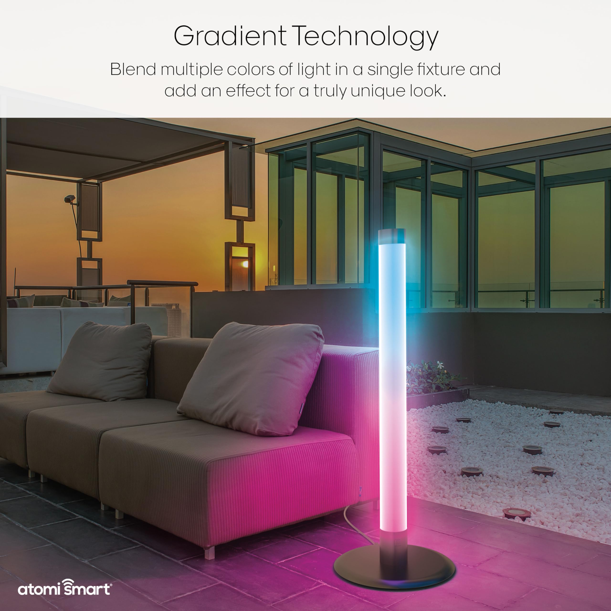 Atomi Smart WiFi LED Outdoor Floor Lamp displaying a smooth gradient of blue to pink light on an outdoor patio.