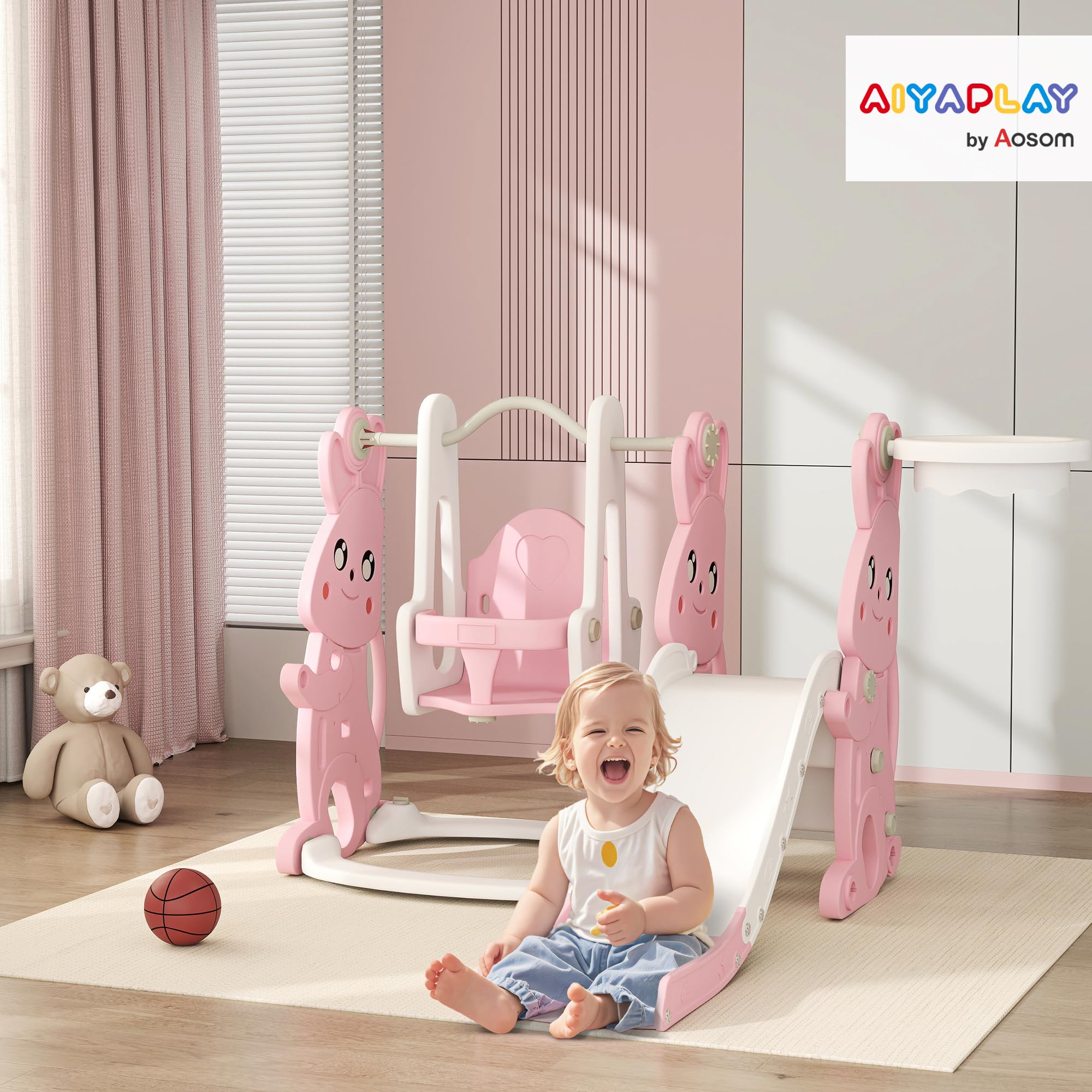AIYAPLAY Tobogán y columpio 4 en 1 para niños, parque infantil para niños pequeños con estructura de escalada, canasta de baloncesto, tobogán, columpio, diseño de conejito, para interiores y
