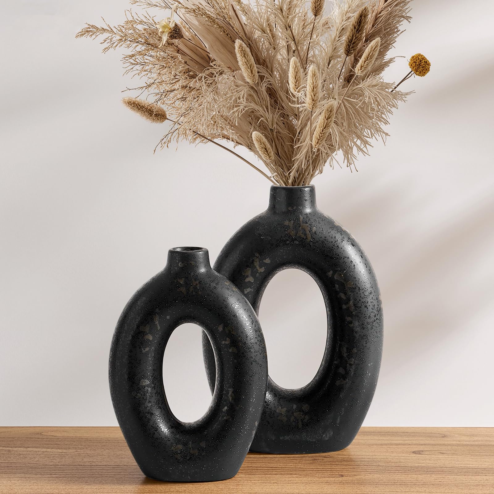 Photo 1 of LE TAUCI Ceramic Vases Set of 2, Black Hollow Donut Flower Vases, Modern Decorative Centerpiece for Home Decor, Coffee Table, Shelf, Mantel, Black Bronze Speckle (H10.5”xW8.5”)
