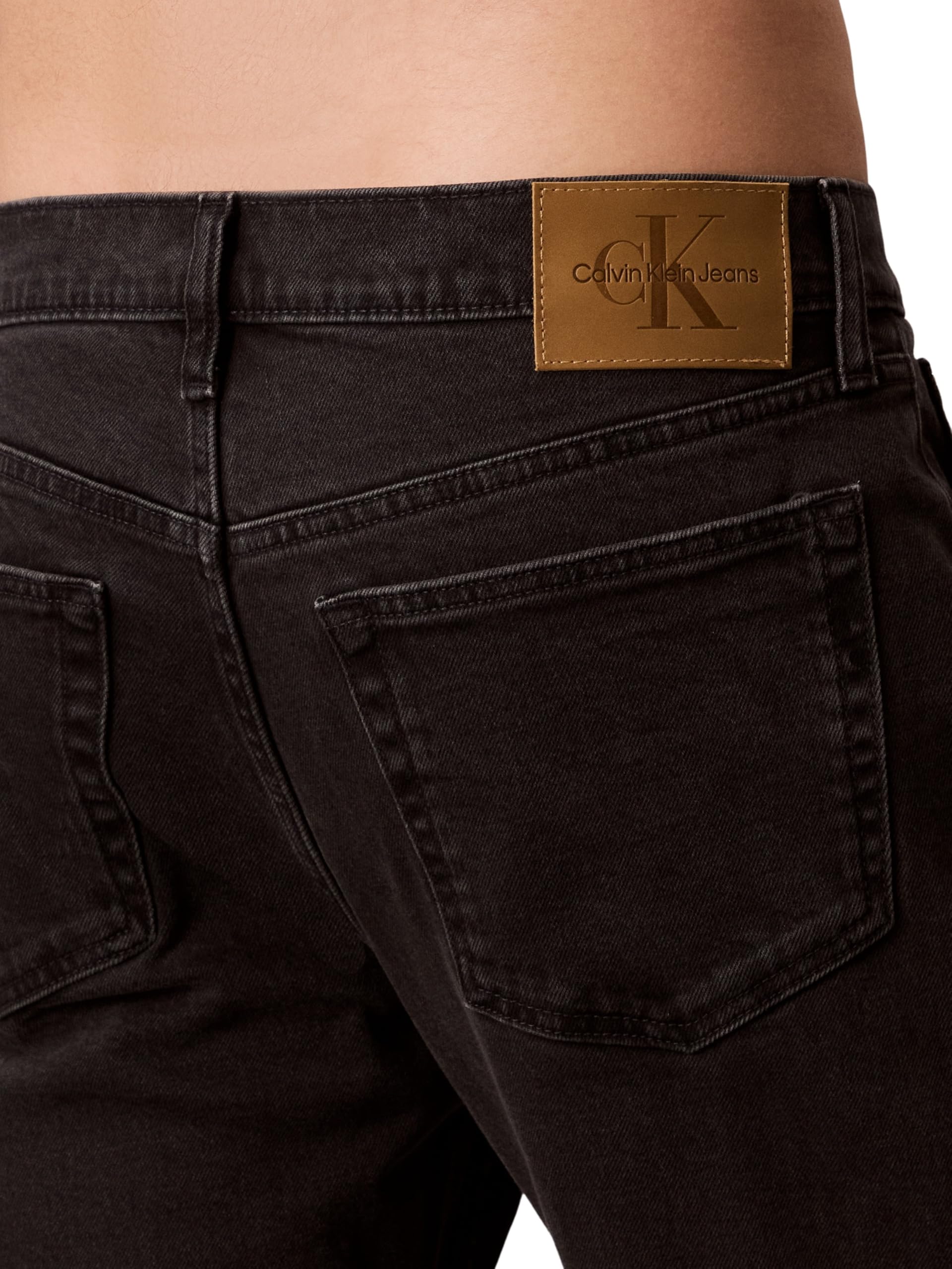Calvin Klein Vaqueros Hombre Slim Black Oil Slick Tapered Fit