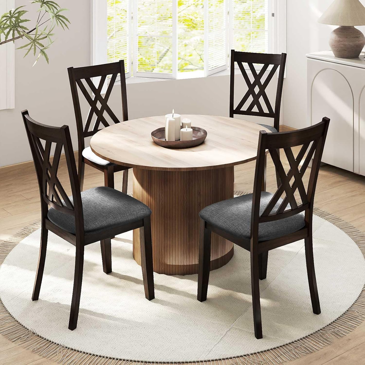 Four assembled COSTWAY dining chairs around a dining table