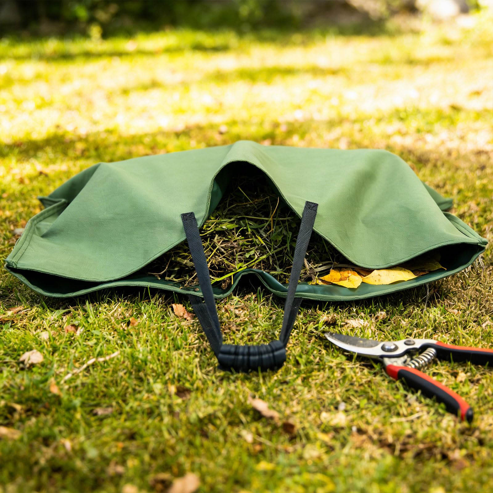 Innovativo cestino per rifiuti da giardino con semplice funzione pieghevole per una pulizia senza sforzo. Robusto sacco per rifiuti da giardino con impugnatura comoda che riduce