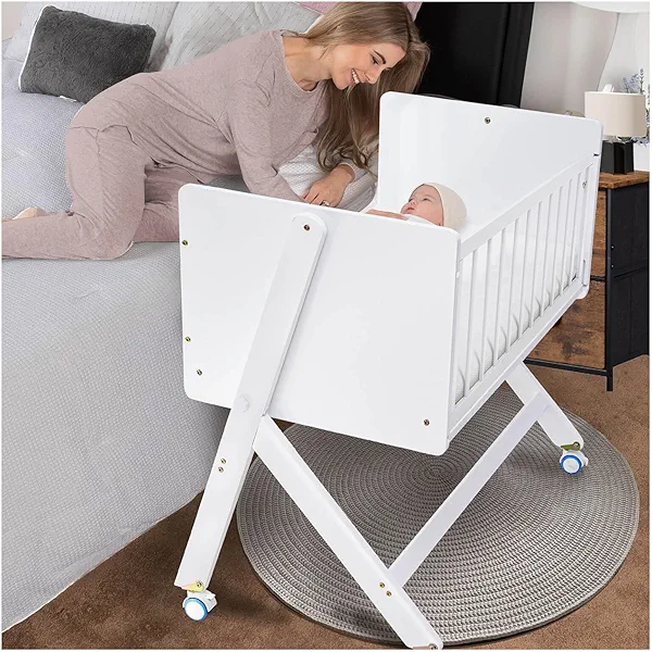 Flwrgirl Wood Bedside Bassinet,15° Rocking Baby Bassinet Bedside Sleeper,Mini Crib for Newborn,Baby Crib with Side Rail Opens & Stores Under Sleep Board,360° Swivel Wheels,Soft Mattress