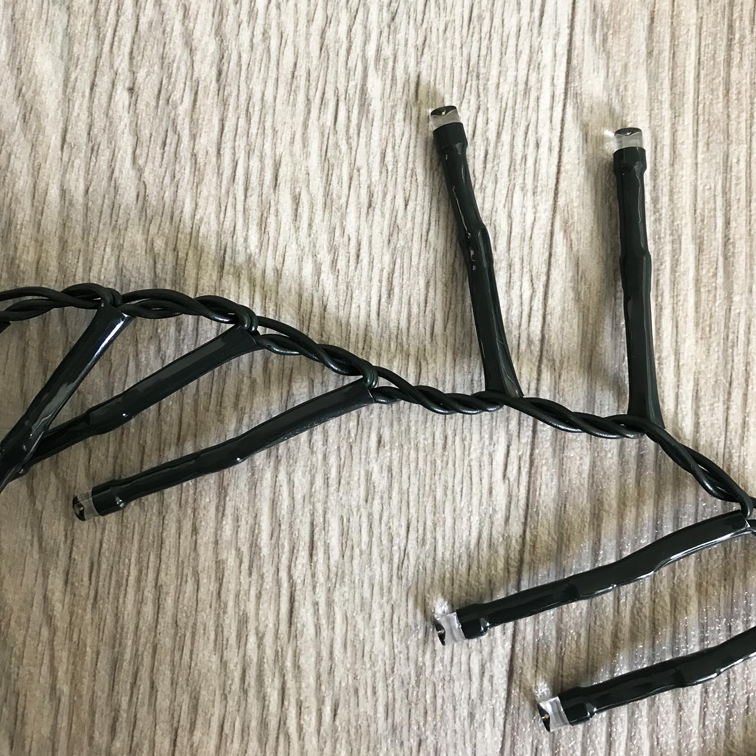 1200er Cluster-Lichterkette Weihnachtsbeleuchtung LEDs Innen und Außen Trafo warmweiß Kabel Dunkelgrün