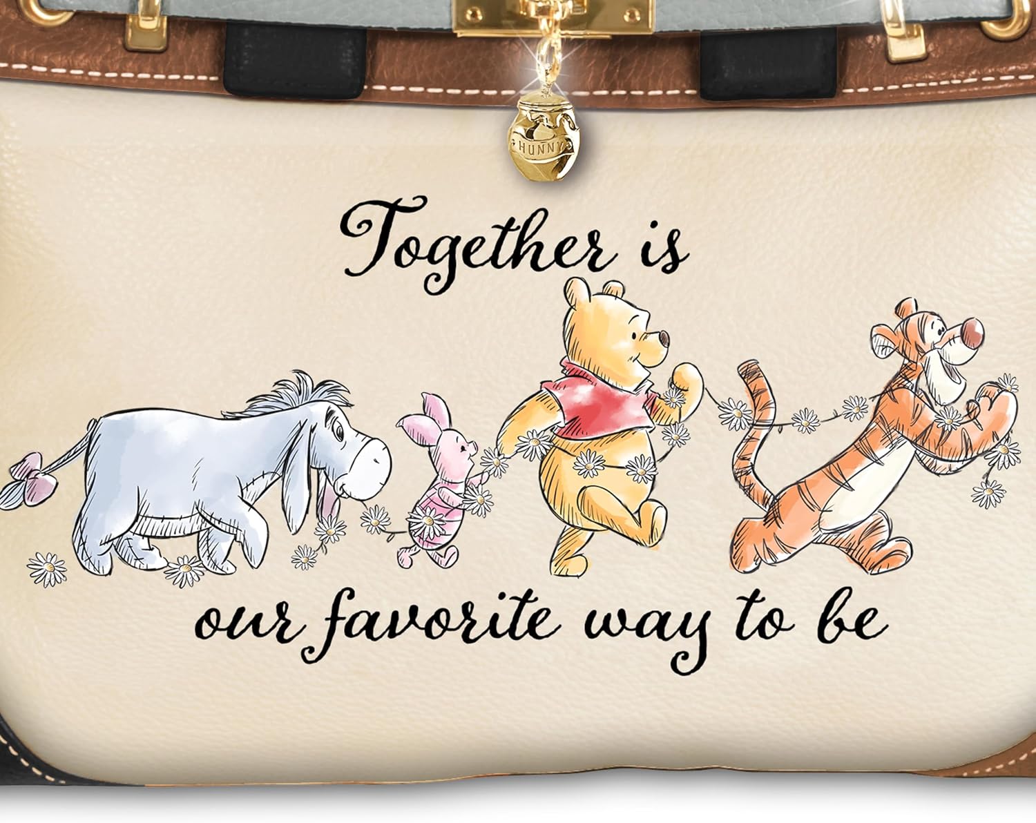 Disney's Winnie The Pooh Faux Leather Handbag Adorned With Colorful Winnie The Pooh Character Art With An Adjustable Strap And Gold-Tone Hardware