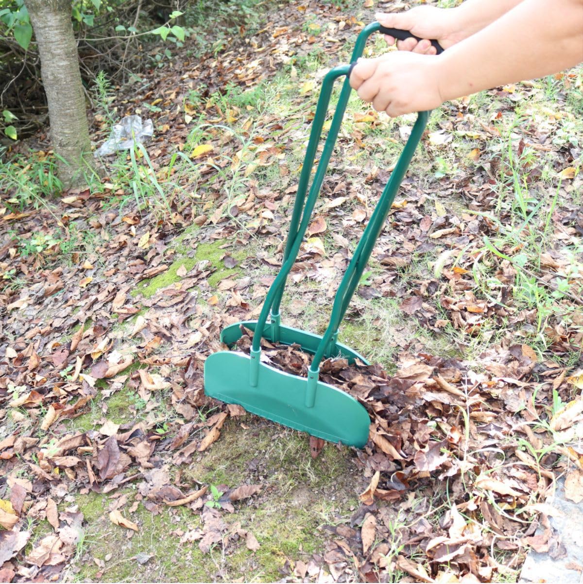 Agarre de jardín de mango largo para una recogida eficiente de hojas y hierba, diseño de paleta de plástico resistente para una fácil recogida y recogida