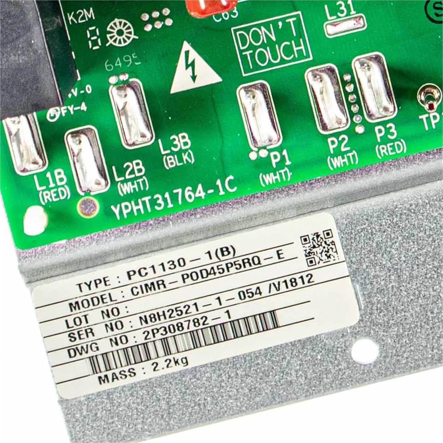 Close-up of terminal blocks and a 'DON'T TOUCH' warning on the PC1130-1 PCB.