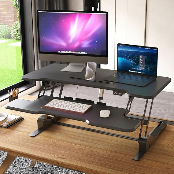 Mount-It! Electric Standing Desk Converter with 38 Tabletop, Height Adjustable Sit Stand Desk Riser, Motorized Desk Riser with Keyboard Tray and Device Slot, Fits Monitor & Laptop, Black