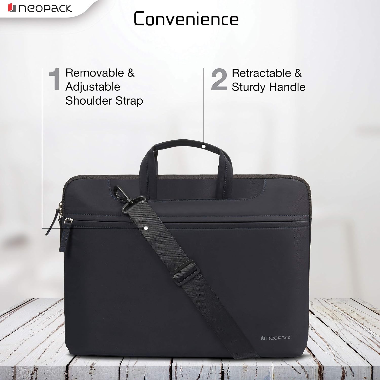 Neopack Svelte Sleeve with an adjustable shoulder strap attached and the top handles visible.