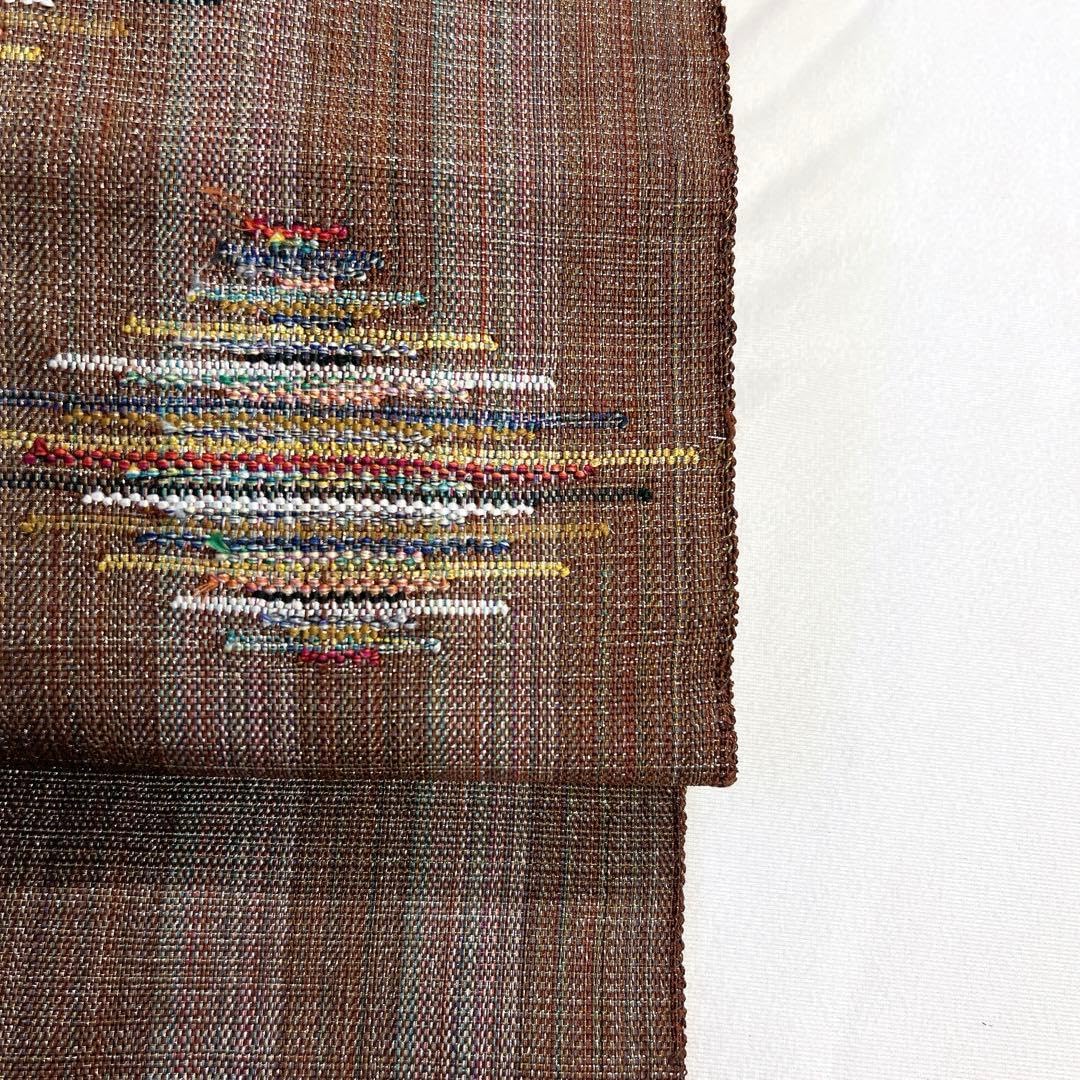 名古屋帯 単衣 縦縞 抽象模様 ブラウンカラー 金糸 着物 104tz