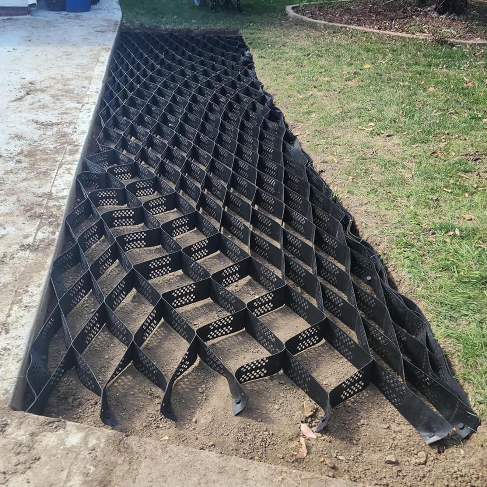 Pavés perméables pour allée carrossable et stabilisateur pliable de parking