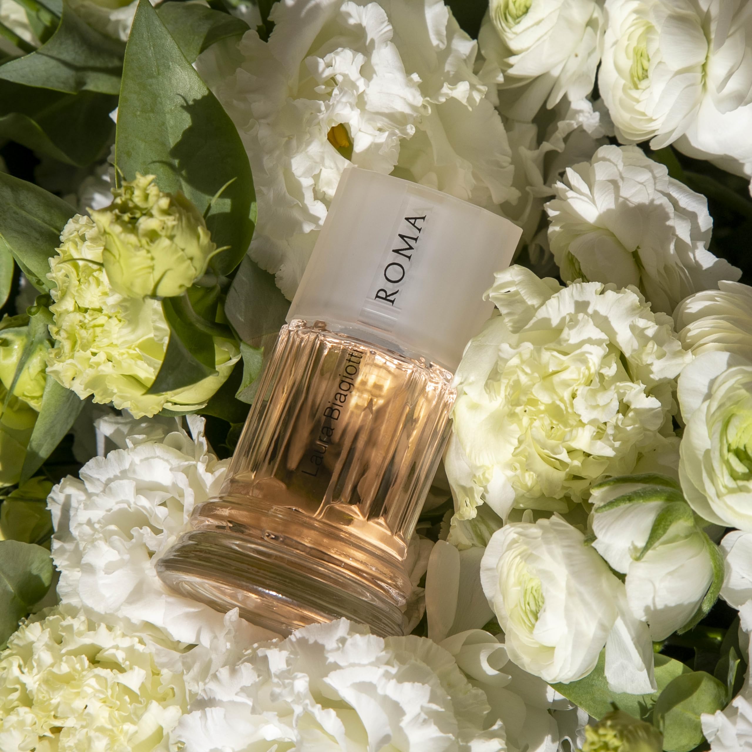 Laura Biagiotti Roma Fiori Bianchi Eau de Toilette 100 ml für Damen – blumig-holziger Duft mit orientalischen Noten – ikonischer Flakon, inspiriert von römischen dorischen Säulen