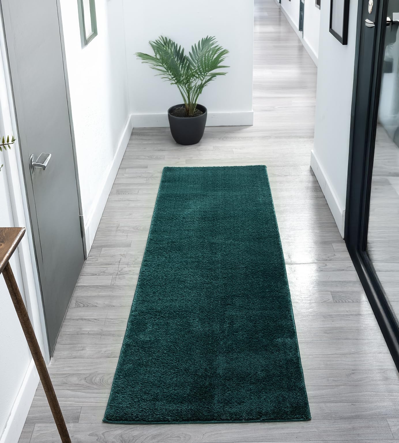 Comfy Washable Low Pile Living Room Area RugAnti-Slip Felt Backing Emerald 60Cm X 200Cm from B&Q