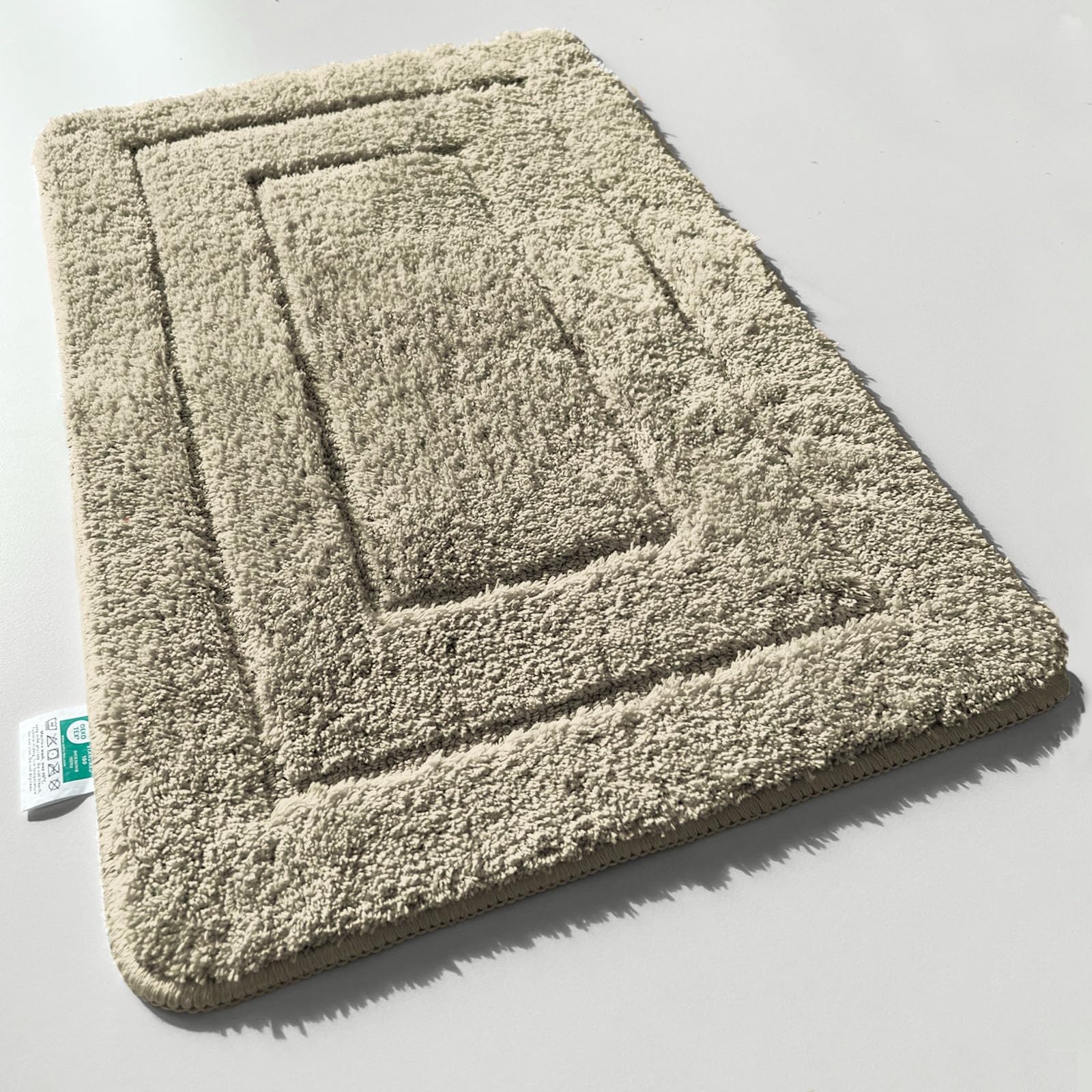 KARAT Badteppich Atlantis - extra flauschig & schnelltrocknend - Badezimmerteppich mit rutschsicherer Rückseite - Badematte Duschvorleger (60 x 100 cm, Beige)