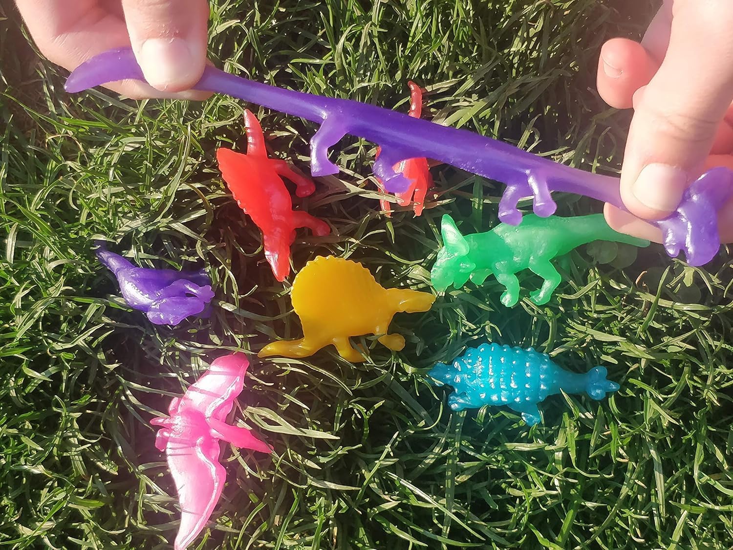 UpBrands 48 Stretchy Dinosaurs Toys 2 1/2 Inches Bulk Set, 8 Glitter Colors, Kit for Birthday Party Favors for Kids, Goodie Bags, Easter Egg Basket Stuffers, Pinata Filler, Students Rewards