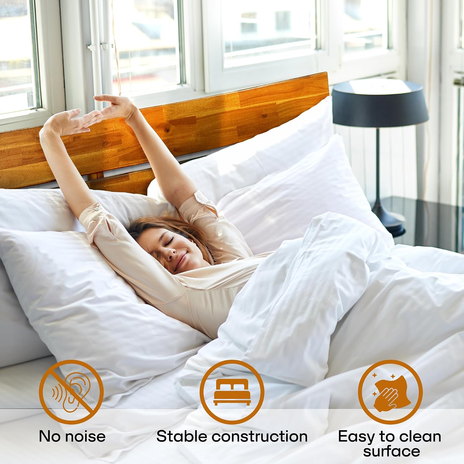 Woman stretching on the bed, highlighting no noise, stable construction, and easy-to-clean surface