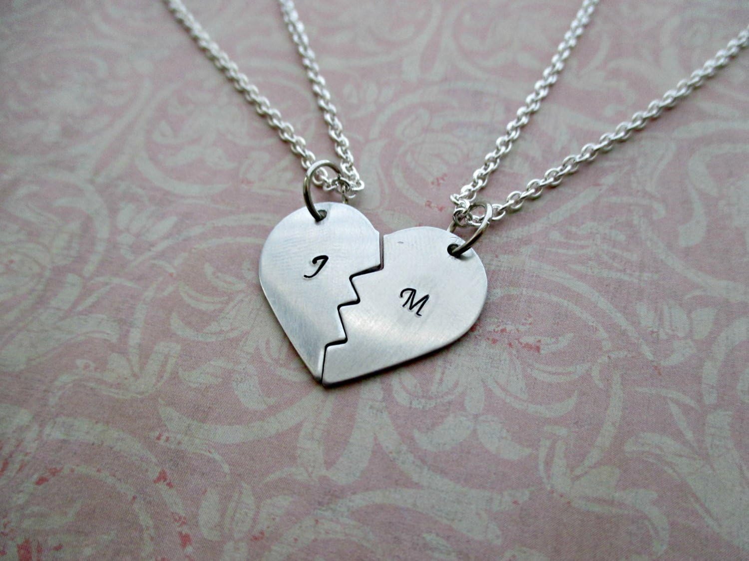 Hand stamped aluminum two halves of one heart broken heart friendship necklace with initials