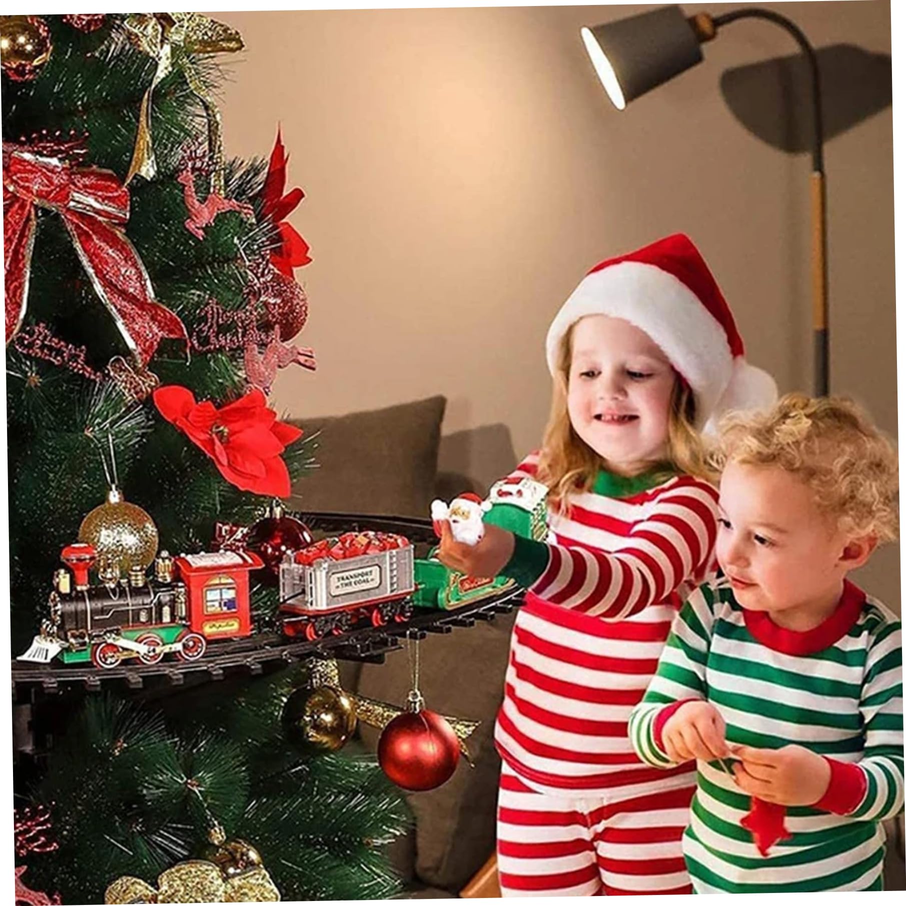 Set di treni di Natale, treno elettrico con binario, suono e luce, giocattolo interattivo per la decorazione dell'albero natalizio dei bambini