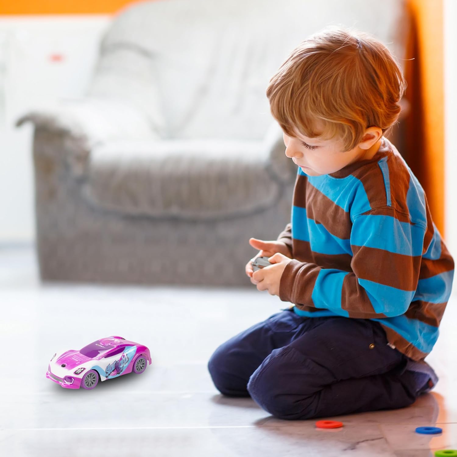 Child playing with Exost Star Light RC Car
