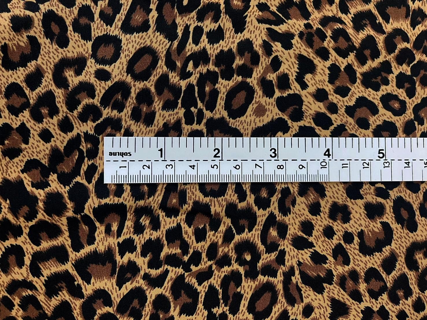 AMORNPHAN 44 Inch Brown Color Leopard Pattern Animal Cheetah Tiger Print 100% Cotton Fabric for Patchwork Needlework DIY Handmade Sewing Crafting for 1 Yard.