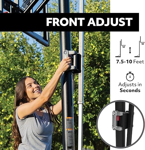 Miniatura 4 de Lifetime 90061 - Sistema de baloncesto portátil, tablero trasero inastillable de 52 pulgadas, baloncesto negro y Spalding Street al aire libre de