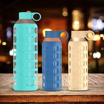 Purifyou Glass Water Bottle Bundle with Time & Volume Markings This set features three reusable glass bottles in distinct colors Aqua Blue 32oz, Chinese Porcelain 12oz, and Pearled Ivory 12oz.