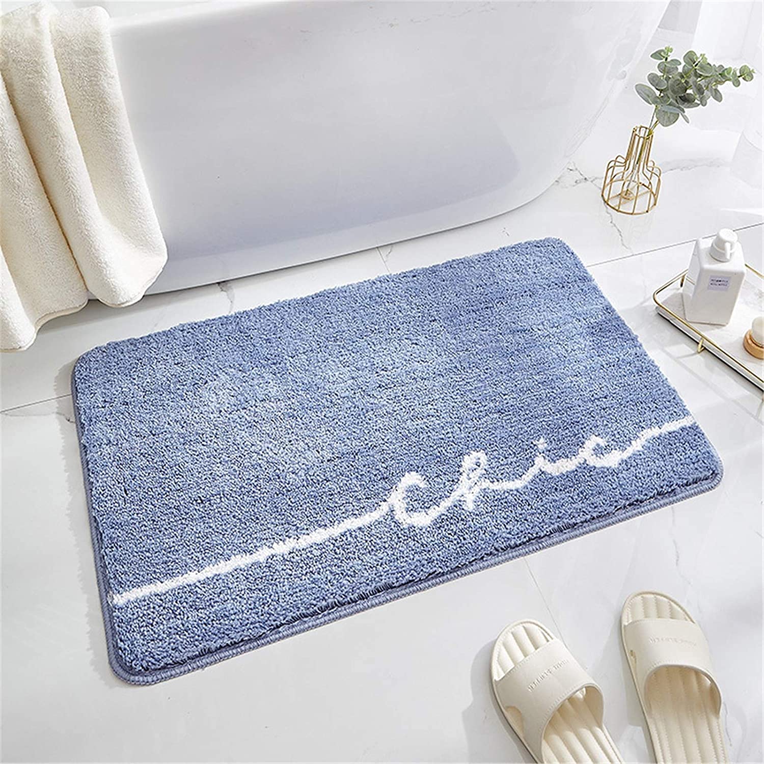 Tapis de salle de bain bleu microfibre pour éviter les glissades sur sol mouillé