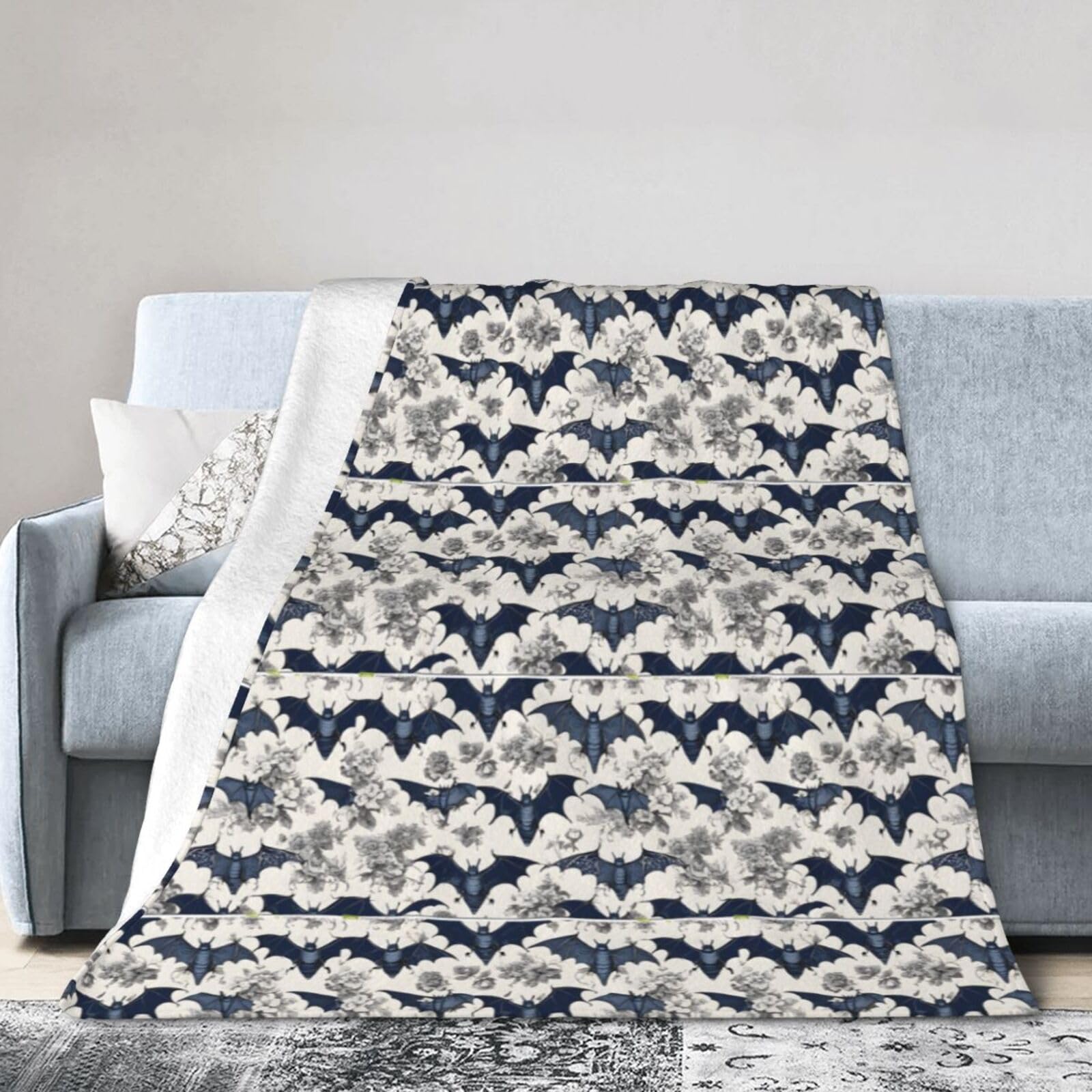 Couverture flanelle chauve-souris contre le froid au bureau et lit