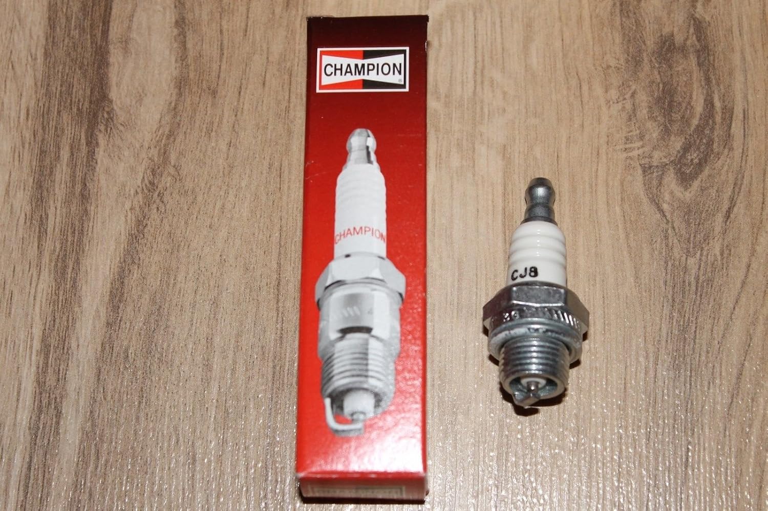 Box of 4 (Four) Champion CJ8, 843 Spark Plug Replaces NGK BM6A, 5921; Bosch WS8E 7543