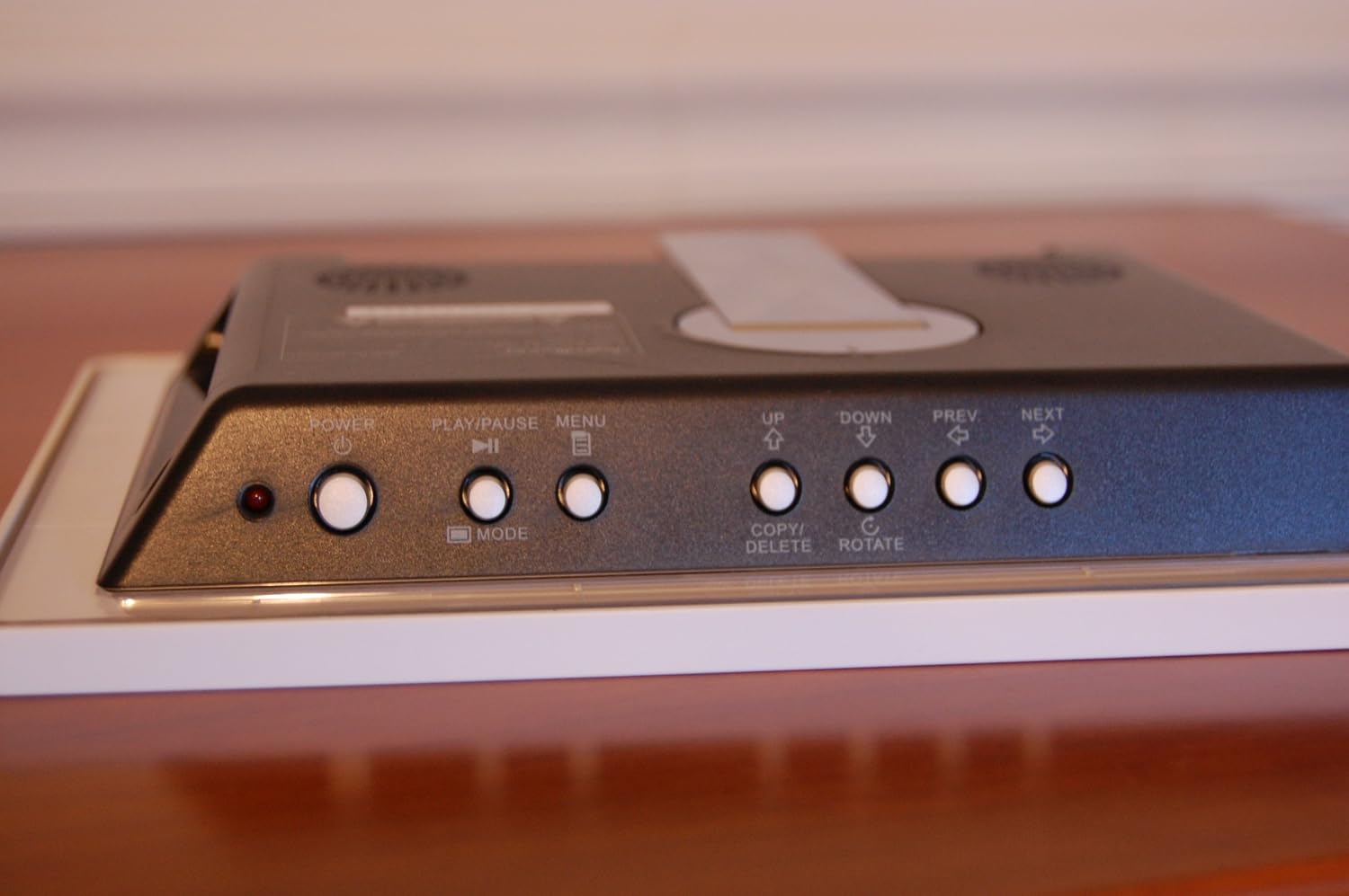Close-up of the control buttons on the back of the digital picture frame.