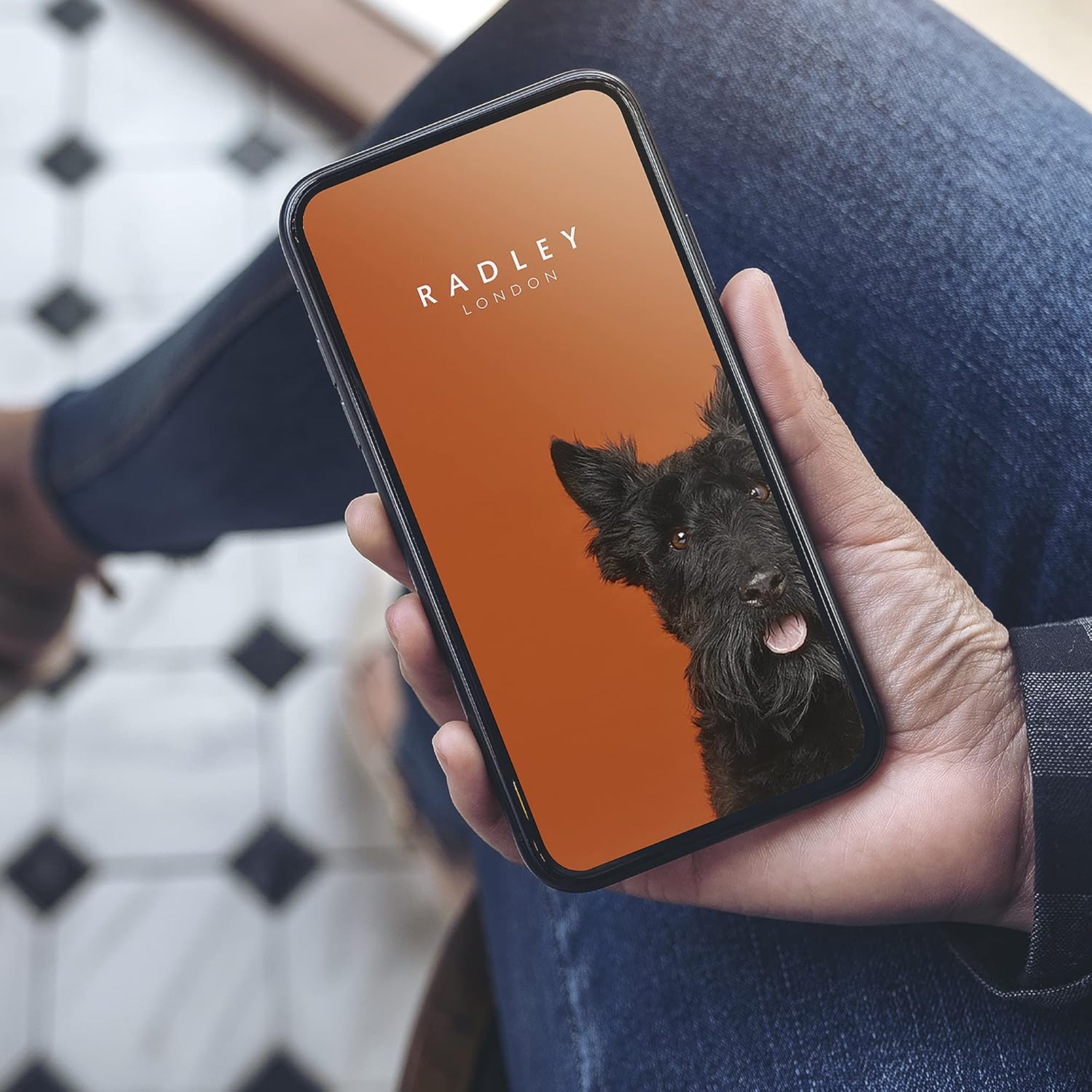 Smartphone displaying the Radley London app interface.