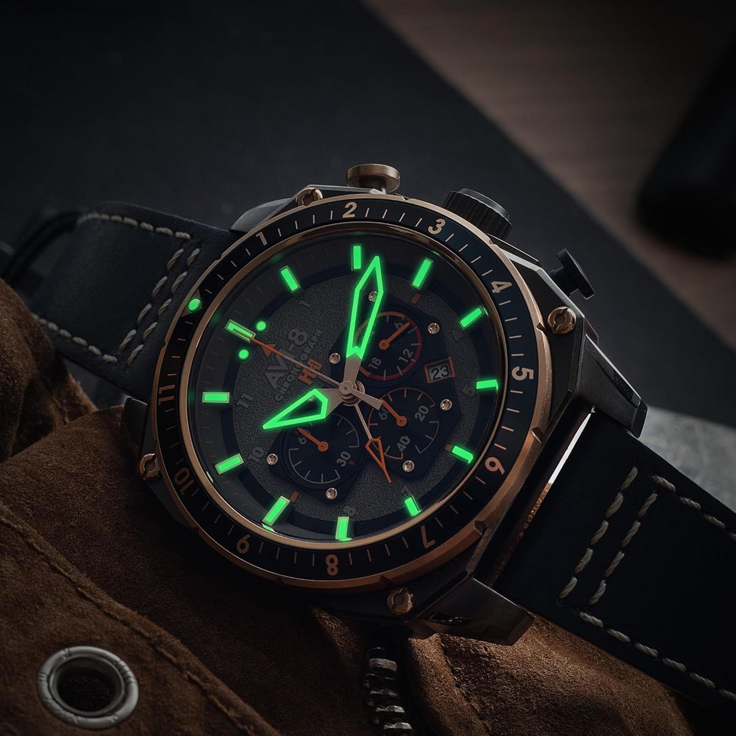 Close-up of AVI-8 Hawker Hunter watch face with glowing hands and markers